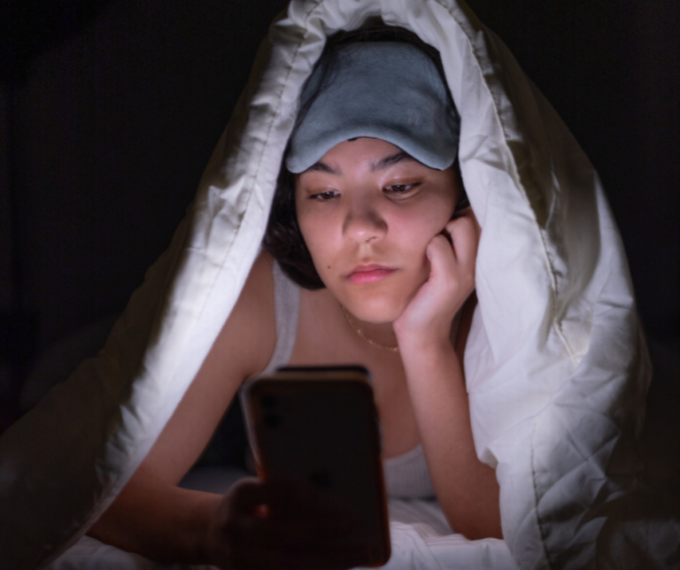 Scrolling on Your Phone in Bed Can Ruin Your Sleep, Study Says